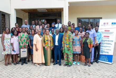 Group picture of the scholars and participants physically present at the public lecture